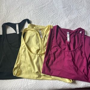 Fabletics racerback active tank bundle • small • black/fuchsia/yellow